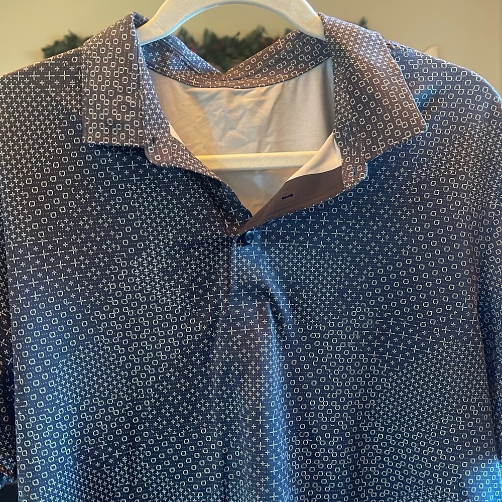 Men’s Lululemon polo shirt, size tag missing, but I believe large size.